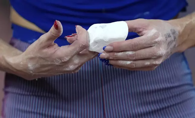 United States' Katie Moon gets ready to compete in the women's pole vault final at the World Athletics Championships in Tokyo, Wednesday, Sept. 17, 2025. (AP Photo/Matthias Schrader)
