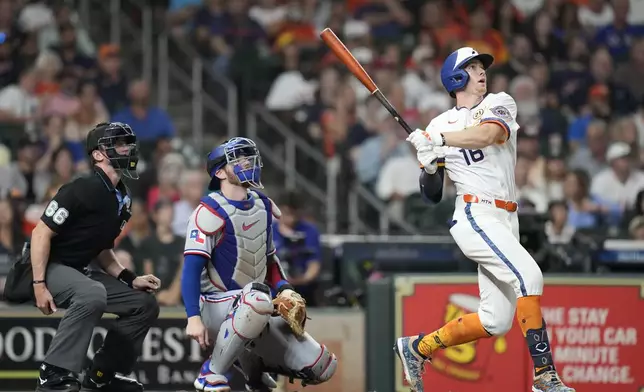 Houston Astros' Zachary Cole (16) watches his two-run home run off Texas Rangers starting pitcher Jack Leiter during the fifth inning of a baseball game Monday, Sept. 15, 2025, in Houston. (AP Photo/Karen Warren)