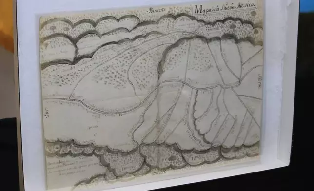 A centuries-old map is displayed at a ceremony marking its return to Mexico's national archives in Albuquerque, New Mexico, on Tuesday, Sept. 23, 2025. (AP Photo/Susan Montoya Bryan)