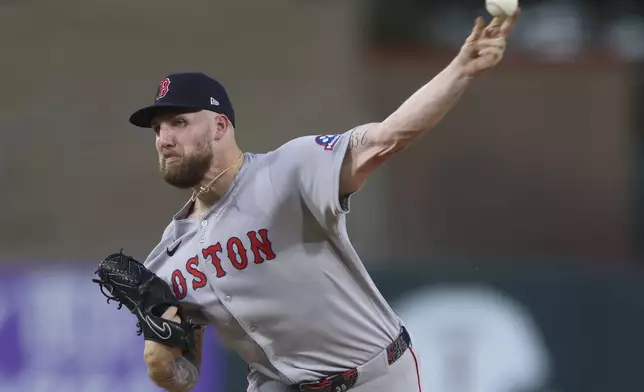 Boston Red Sox pitcher Garrett Crochet throws to an Athletics batter during the first inning of a baseball game Monday, Sept. 8, 2025, in West Sacramento, Calif. (AP Photo/Scott Marshall)