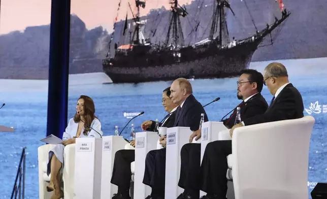 From left: TV anchor Maria Rybakova, Laotian Prime Minister Sonexay Siphandone, Russian President Vladimir Putin, Mongolian Prime Minister Gombojav Zandanshatar and China's Vice Chairman of the standing committee of the country's National People's Congress Li Hongzhong attend the plenary session of the Eastern Economic Forum in Vladivostok, Russia, Friday, Sept. 5, 2025. (Alexander Kazakov, Sputnik, Kremlin Pool Photo via AP)