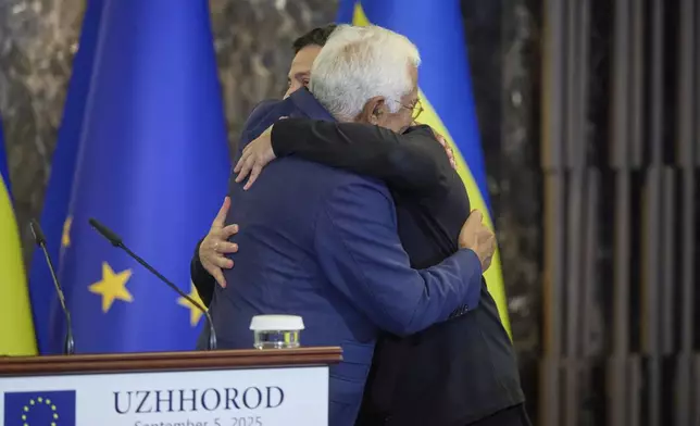 In this photo provided by the Ukrainian Presidential Press Office, Ukrainian President Volodymyr Zelenskyy, right, and European Council President Antonio Costa greet each other in Uzhhorod, Ukraine, Friday, Sept. 5, 2025. (Ukrainian Presidential Press Office via AP)