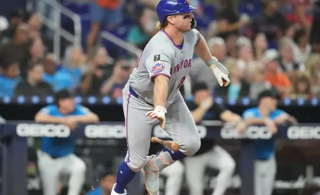 New York Mets' Pete Alonso drops his bat to run as he flies out with the bases loaded during the fifth inning of a baseball game against the Miami Marlins, Sunday, Sept. 28, 2025, in Miami. (AP Photo/Lynne Sladky)