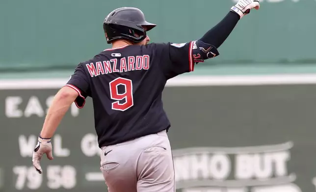 Cleveland Guardians' Kyle Manzardo gestures after hitting a home run during the eighth inning of a baseball game against the Boston Red Sox, Monday, Sept. 1, 2025, in Boston. (AP Photo/Mark Stockwell)