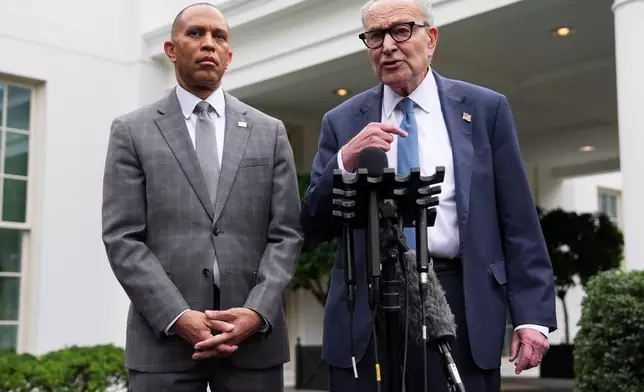 Senate Minority Leader Chuck Schumer, D-N.Y., right, and House Minority Leader Hakeem Jeffries, D-N.Y., speak to members of the media outside the West Wing at the White House in Washington, Monday, Sept. 29, 2025, in Washington. (AP Photo/Evan Vucci)