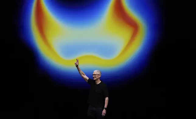 Apple CEO Tim Cook waves on stage during an announcement of new products at Apple Park on Tuesday, Sept. 9, 2025, in Cupertino, Calif. (AP Photo/Godofredo A. Vásquez)