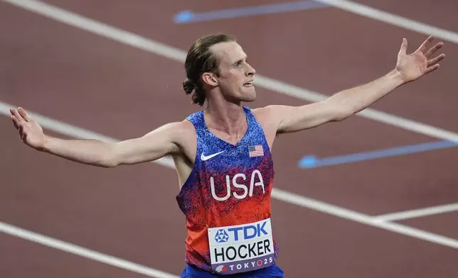 United States' Cole Hocker reacts after winning the gold medal in the men's 5,000 meters final at the World Athletics Championships in Tokyo, Sunday, Sept. 21, 2025. (AP Photo/Abbie Parr)