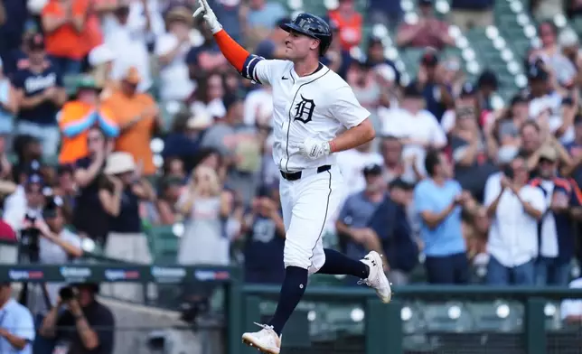 CORRECTS INNING TO SEVENTH, NOT EIGHTH - Detroit Tigers designated hitter Kerry Carpenter celebrates while running the bases after hitting a three-run home run in the seventh inning of a baseball game against the New York Mets, Wednesday, Sept. 3, 2025, in Detroit. (AP Photo/Ryan Sun)