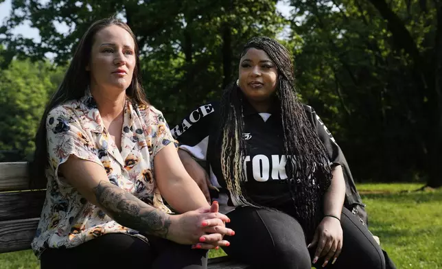 Case worker Sarah Boyle, left, who has worked with Maria Pires, and Britney Jones, Pires' most recent roommate before being deported to Brazil, give an interview in Glen Burnie, Maryland, Wednesday, June 11, 2025. (AP Photo/Stephanie Scarbrough)