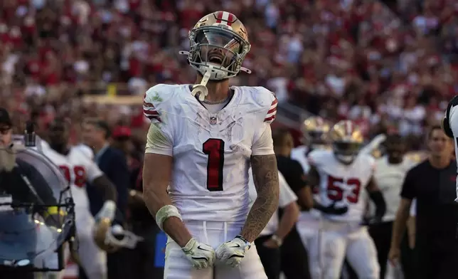 San Francisco 49ers wide receiver Ricky Pearsall celebrates a catch during the second half of an NFL football game against the Arizona Cardinals, Sunday, Sept. 21, 2025, in Santa Clara, Calif. (AP Photo/Godofredo A. Vásquez)
