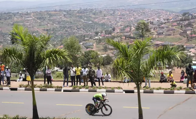 Slovenia's Urska Zigart competes, during the women's elite individual time trial event, at the road cycling World Championships in Kigali, Rwanda, Sunday, Sept. 21, 2025. (AP Photo/Jerome Delay)