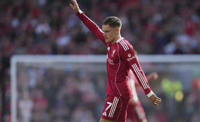 Liverpool's Florian Wirtz gestures during the English Premier League soccer match between FC Liverpool and FC Arsenal in Liverpool, England, Sunday, Aug. 31, 2025. (AP Photo/Jon Super)