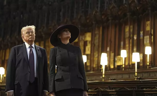 President Donald Trump and first lady Melania Trump attend their visit to St George's Chapel at Windsor Castle, in Windsor, England, Wednesday Sept. 17, 2025. (Aaron Chown/Pool Photo via AP)