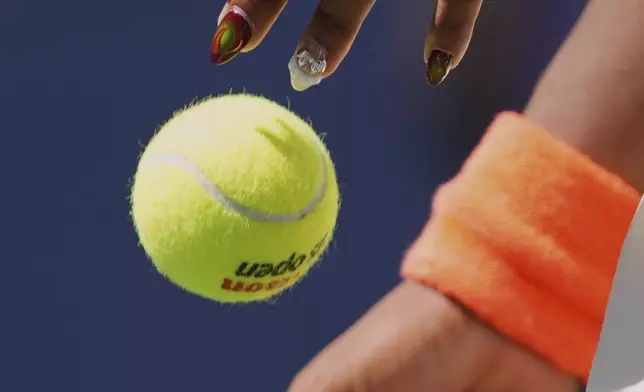 Coco Gauff, of the United States, serves against Magdalena Frech, of Poland, during the third round of the U.S. Open tennis championships, Saturday, Aug. 30, 2025, in New York. (AP Photo/Kirsty Wigglesworth)