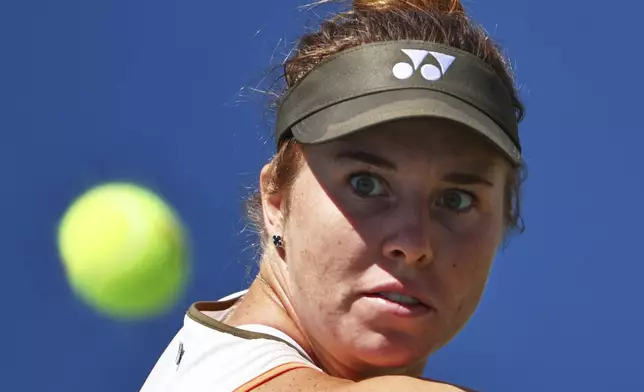 Linda Noskova, of the Czech Republic, returns a shot against Karolina Muchova, of the Czech Republic, during the third round of the U.S. Open tennis championships, Saturday, Aug. 30, 2025, in New York. (AP Photo/Andres Kudacki)