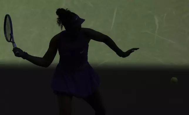 Naomi Osaka, of Japan, returns a shot against Daria Kasatkina, of Australia, during the third round of the U.S. Open tennis championships, Saturday, Aug. 30, 2025, in New York. (AP Photo/Heather Khalifa)