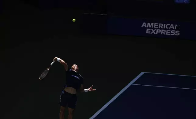 Jiri Lehecka, of the Czech Republic, serves against Adrian Mannarino, of France, during the fourth round of the U.S. Open tennis championships, Sunday, Aug. 31, 2025, in New York. (AP Photo/Pamela Smith)