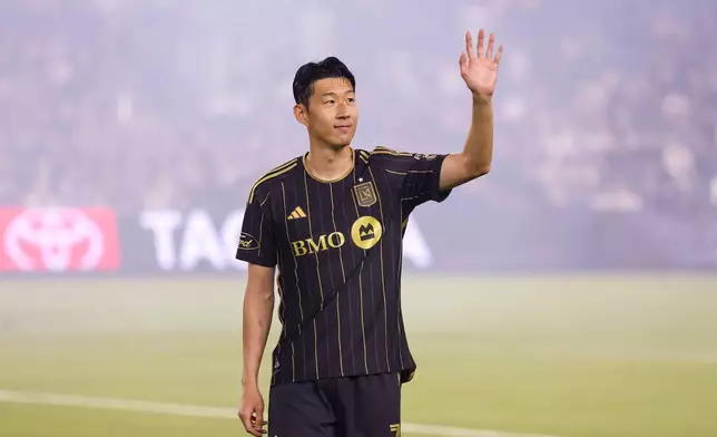 Los Angeles FC forward Son Heung-Min waves to the crowd before an MLS soccer match against San Diego FC, Sunday, Aug. 31, 2025, in Los Angeles, Calif. (AP Photo/Eric Thayer)