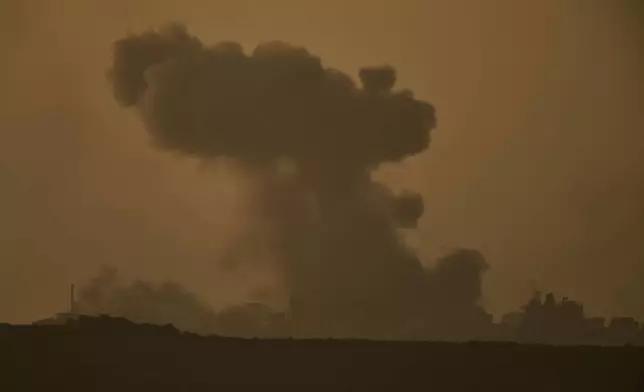 Smoke rises to the sky following an Israeli military strike in the Gaza Strip, as seen from southern Israel, Monday, Sept. 15, 2025. (AP Photo/Leo Correa)