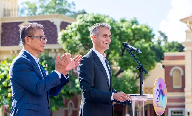 (Right)Josh D'Amaro, Chairman of Disney Experiences.