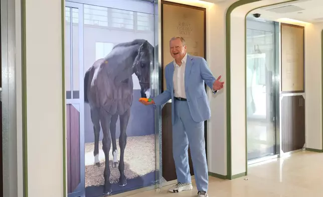 Who wants a treat? A 3D digital version of Golden Sixty at Champions Connection greets The Hong Kong Jockey Club’s Chief Executive Officer Winfried Engelbrecht-Bresges.