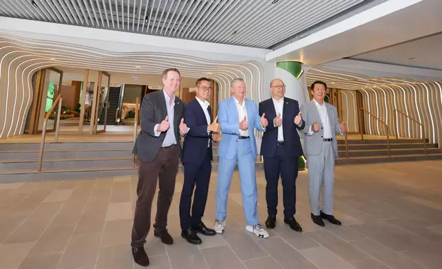 The Hong Kong Jockey Club’s Chief Executive Officer Winfried Engelbrecht-Bresges (centre), Executive Director, Customer Strategy, Insights and Innovation Dennis Hau (2nd left), Executive Director, Corporate Affairs Raymond Tam (2nd right), Executive Director, Racing Andrew Harding (1st left), and Director of Property Philip Chen (1st right) celebrate the soon opening of Champions Connection.