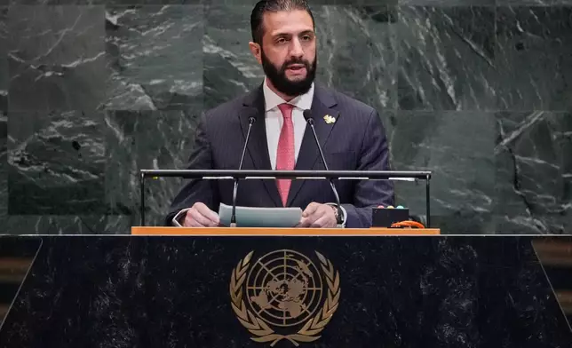 Syria interim President Ahmad Al-Sharaa addresses the 80th session of the United Nations General Assembly, Wednesday, Sept. 24, 2025. (AP Photo/Richard Drew)