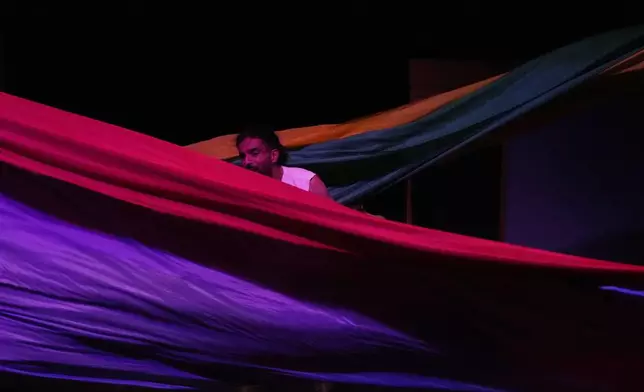 Iranian actor Kamal Razavi performs during a musical play "Mehrara", a love story which takes place in Qajar dynasty era, directed by Daniyal Ghafari, at Neauphle-le-Château theater hall, in Tehran, Iran, Wednesday, Sept. 3, 2025. (AP Photo/Vahid Salemi)