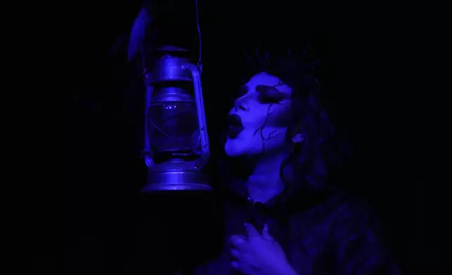 Iranian actress Mahshid Goodarzi performs during a musical play "Mehrara", a love story which takes place in Qajar dynasty era, directed by Daniyal Ghafari, at Neauphle-le-Château theater hall, in Tehran, Iran, Wednesday, Sept. 3, 2025. (AP Photo/Vahid Salemi)