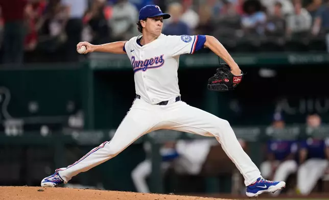 Texas Rangers starting pitcher Jacob deGrom throws to the Minnesota Twins in the third inning of a baseball game Wednesday, Sept. 24, 2025, in Arlington, Texas. (AP Photo/Tony Gutierrez)