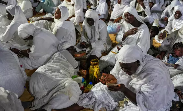 Worshippers gather for prayers as they mark Prophet Muhammad's birthday, known as Mawlid, in Dakar, Senegal, Friday, Sept. 5, 2025. (AP Photo/Misper Apawu)