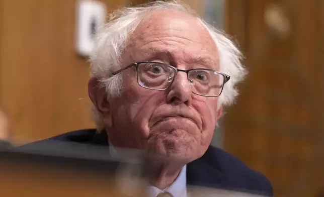 Sen. Bernie Sanders, I-Vt., listens as Secretary of Health and Human Services Robert F. Kennedy Jr., appears before the Senate Finance Committee, on Capitol Hill in Washington, Thursday, Sept. 4, 2025. (AP Photo/Mark Schiefelbein)