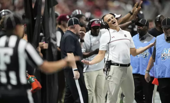 South Carolina head coach Shane Beamer reacts on the sideline during an NCAA college football game against Virginia Tech, Sunday, Aug. 31, 2025, in Atlanta. (AP Photo/Brynn Anderson)