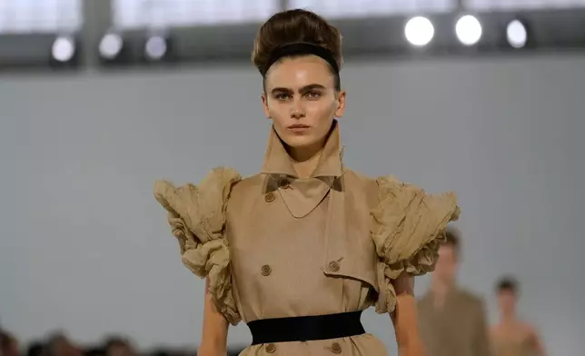 A model wears a creation part of the Max Mara women's Spring-Summer 2026 collection, presented in Milan, Italy, Thursday, Sept. 25, 2025. (AP Photo/Luca Bruno)