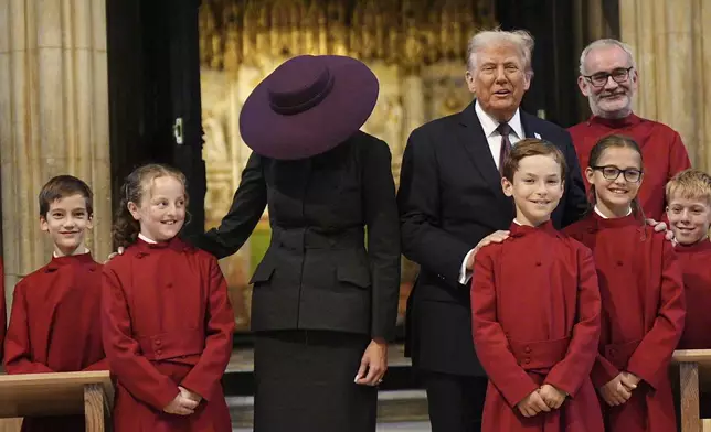 President Donald Trump and first lady Melania Trump attend their visit to St George's Chapel at Windsor Castle, in Windsor, England, Wednesday Sept. 17, 2025. (Aaron Chown/Pool Photo via AP)