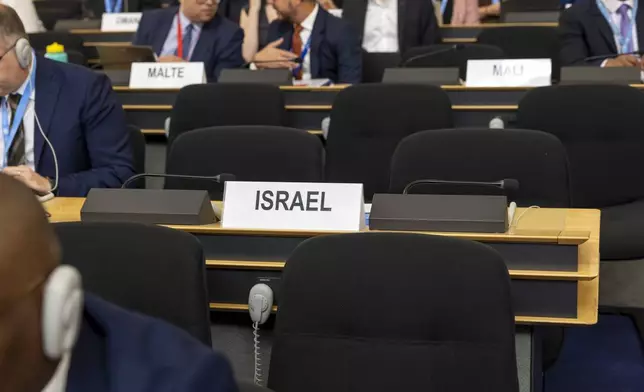 The empty seat of the Israeli delegation, during the 60th session of the Human Rights Council, at the European headquarters of the United Nations in Geneva, Switzerland, Monday, Sept. 8, 2025. (Salvatore Di Nolfi/Keystone via AP)