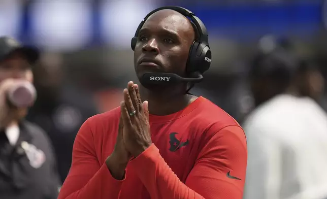 Houston Texans head coach DeMeco Ryans reacts on the sideline during the first half of an NFL football game against the Los Angeles Rams, Sunday, Sept. 7, 2025, in Inglewood, Calif. (AP Photo/Gregory Bull)