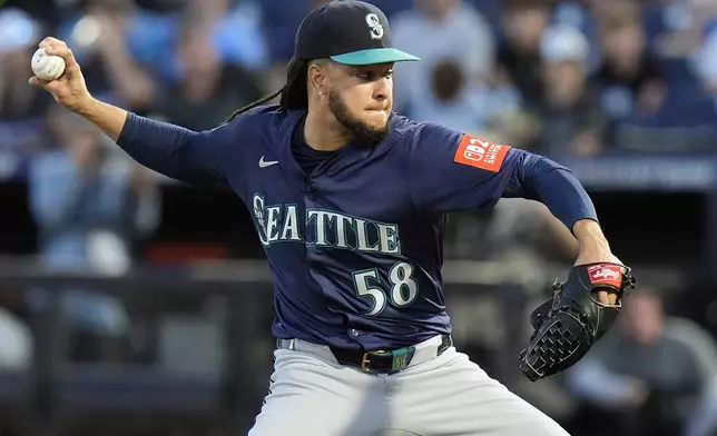 Seattle Mariners pitcher Luis Castillo (58) delivers to the Tampa Bay Rays during the first inning of a baseball game Monday, Sept. 1, 2025, in Tampa, Fla. (AP Photo/Chris O'Meara)