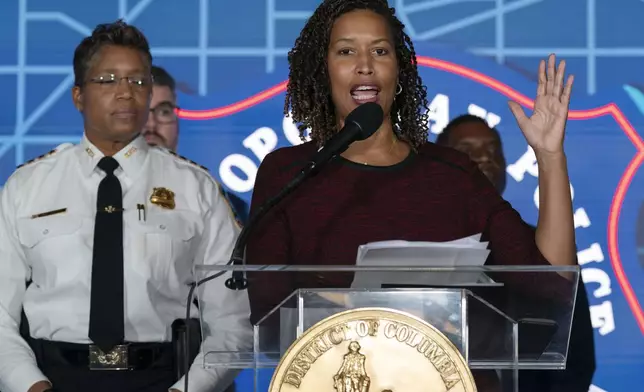 District of Columbia Mayor Muriel Bowser flanked by Pamela Smith, Chief of Police of the Metropolitan Police Department speaks during a news conference at Metropolitan Police Department Headquarters in Washington, Wednesday, Sept. 3, 2025. (AP Photo/Jose Luis Magana)