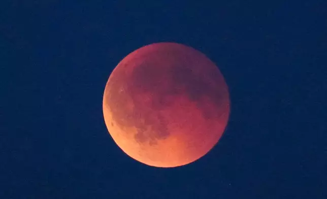 Total lunar eclipse and Blood Moon in Koege, Denmark, Sunday, Sept. 7, 2025. (Mads Claus Rasmussen/Ritzau Scanpix via AP)
