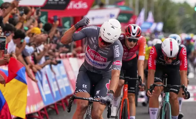 Belgian cyclist Jasper Philipsen wins the nineteenth stage of the Spanish La Vuelta cycling race, from Rueda to Guijuelo, Spain, Friday, Sept. 12, 2025. (AP Photo/Manu Fernandez)