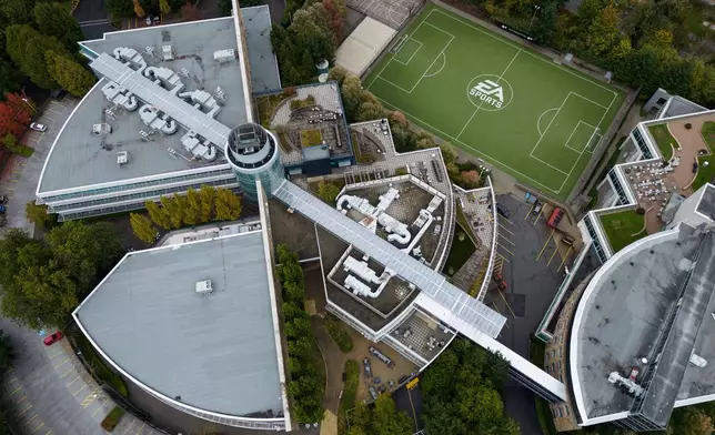 The EA Sports logo is seen on a soccer pitch at the Electronic Arts' office and studio complex, in Burnaby, British Columbia, Monday, Sept. 29, 2025. (Darryl Dyck/The Canadian Press via AP)