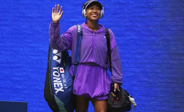 Naomi Osaka, of Japan, arrive for her match against Coco Gauff, of the United States, during the fourth round of the US Open tennis championships, Monday, Sept. 1, 2025, in New York. (AP Photo/Kirsty Wigglesworth)