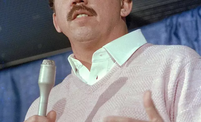 FILE - New York Mets Manager Davey Johnson speaks to reporters after game 7 of the World Series was postponed a day due to rain, in New York, Oct. 26, 1986. (AP Photo/Richard Drew, File)