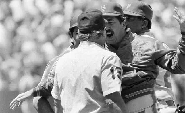 FILE - New York Mets' manager Davey Johnson argues with home plate umpire Jim Quick after Mets' Keith Hernandez was ejected after arguing over a strike three call in the eighth inning of a baseball game against the San Francisco Giants,, May 30, 1985 at Candlestick Park in San Francisco. (AP Photo/Paul Sakuma, File)