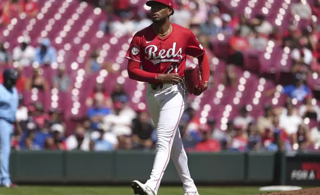 Cincinnati Reds' Hunter Greene walks off the mount after striking out Toronto Blue Jays' Nathan Lukes to end the top of the second inning of a baseball game Monday, Sept. 1, 2025, in Cincinnati. (AP Photo/Kareem Elgazzar)