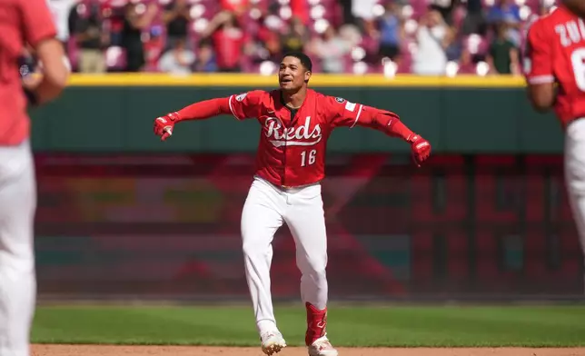 Cincinnati Reds' Noelvi Marte celebrates after hitting a walkoff two-run single in the ninth inning of a baseball game against the Toronto Blue Jays, Monday, Sept. 1, 2025, in Cincinnati. (AP Photo/Kareem Elgazzar)