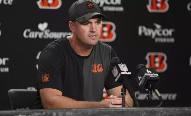 Cincinnati Bengals head coach Zac Taylor answers questions after an NFL football game against the Jacksonville Jaguars, Sunday, Sept. 14, 2025, in Cincinnati. (AP Photo/Jeff Dean)