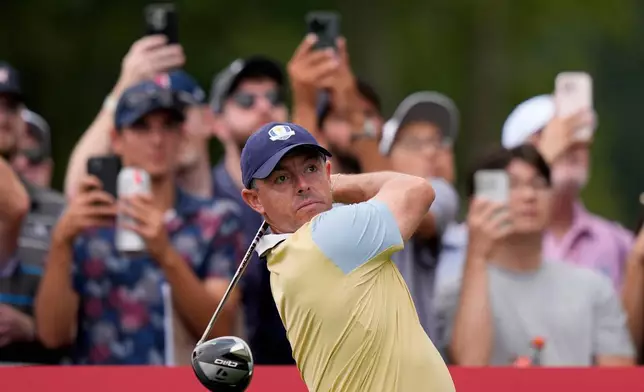 Europe's Rory McIlroy, of Northern Ireland, watches his tee shot on the 12th hole during a practice round for the Ryder Cup golf tournament, Wednesday, Sept. 24, 2025, on the Bethpage Black golf course, in Farmingdale, N.Y. (AP Photo/Robert Bukaty)