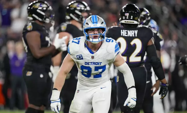 Detroit Lions defensive end Aidan Hutchinson reacts after sacking Baltimore Ravens quarterback Lamar Jackson during the second half of an NFL football game Monday, Sept. 22, 2025, in Baltimore. (AP Photo/Stephanie Scarbrough)